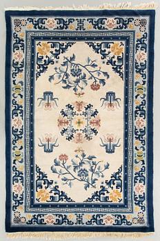 An old Chinese carpet ca 187 x 127 cm.