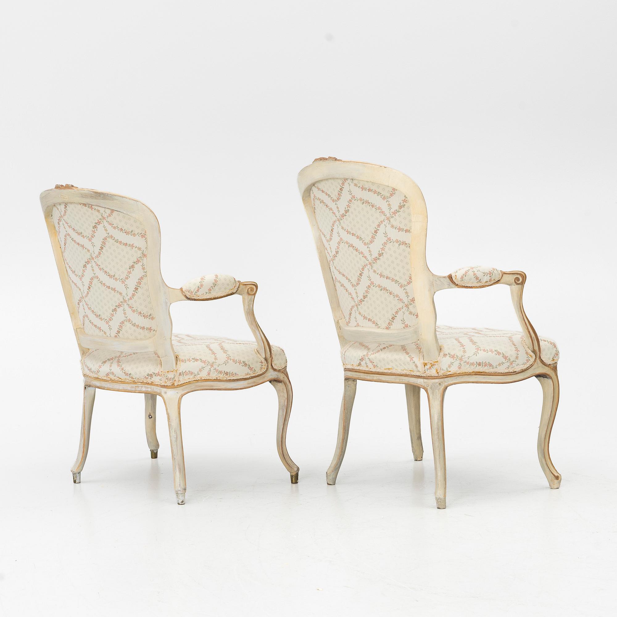A matched pair of Rococo armchairs, 18th Century.