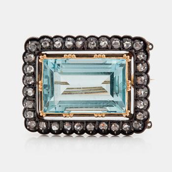 867. A BROOCH set with a rectangular step-cut aquamarine and rose-cut diamonds.