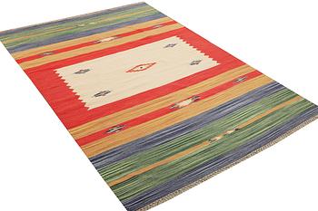 A Durry carpet, c. 300 x 200 cm.