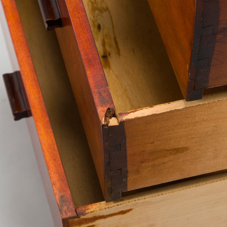 A 1930s functionalist style chest of drawer.