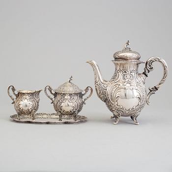 A rococo style 4 part silver coffee service dated 1954.