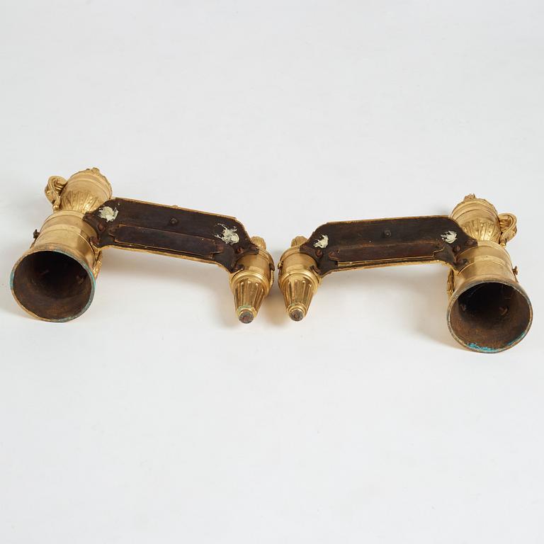 A pair of Louis XVI 18th Century bronze chenets.