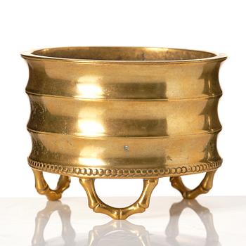 A gilt bronze tripod censer, Qing dynasty, possibly 18th Century.