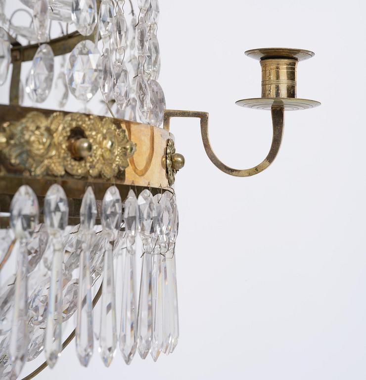 A late Gustavian gilt brass and cut glass seven-light chandelier, Stockholm late 18th century.