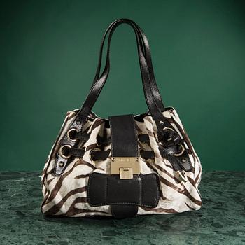 A bag by JIMMY CHOO.