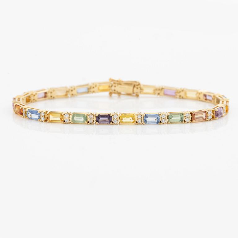 Bracelet 18K gold with multi-coloured sapphires and round brilliant-cut diamonds.