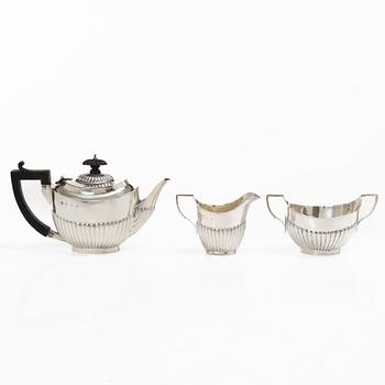 Thomas Hayes, a silver teapot, cream jug and sugar bowl, Birmingham 1897.