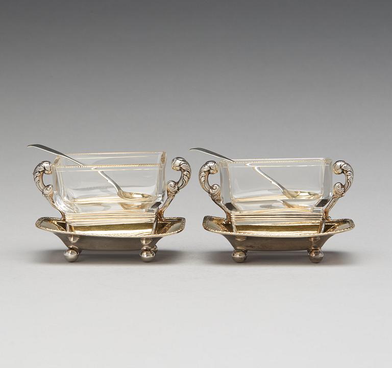 A pair of Swedish 19th century parcel-gilt silver and glass jelly-bowls, mark of Carl Tengstedt, Gothenburg 1839.