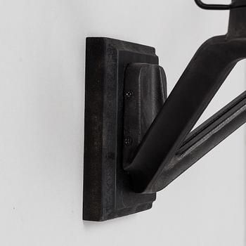 TOM DIXON, a pair of 'Base' wall light.