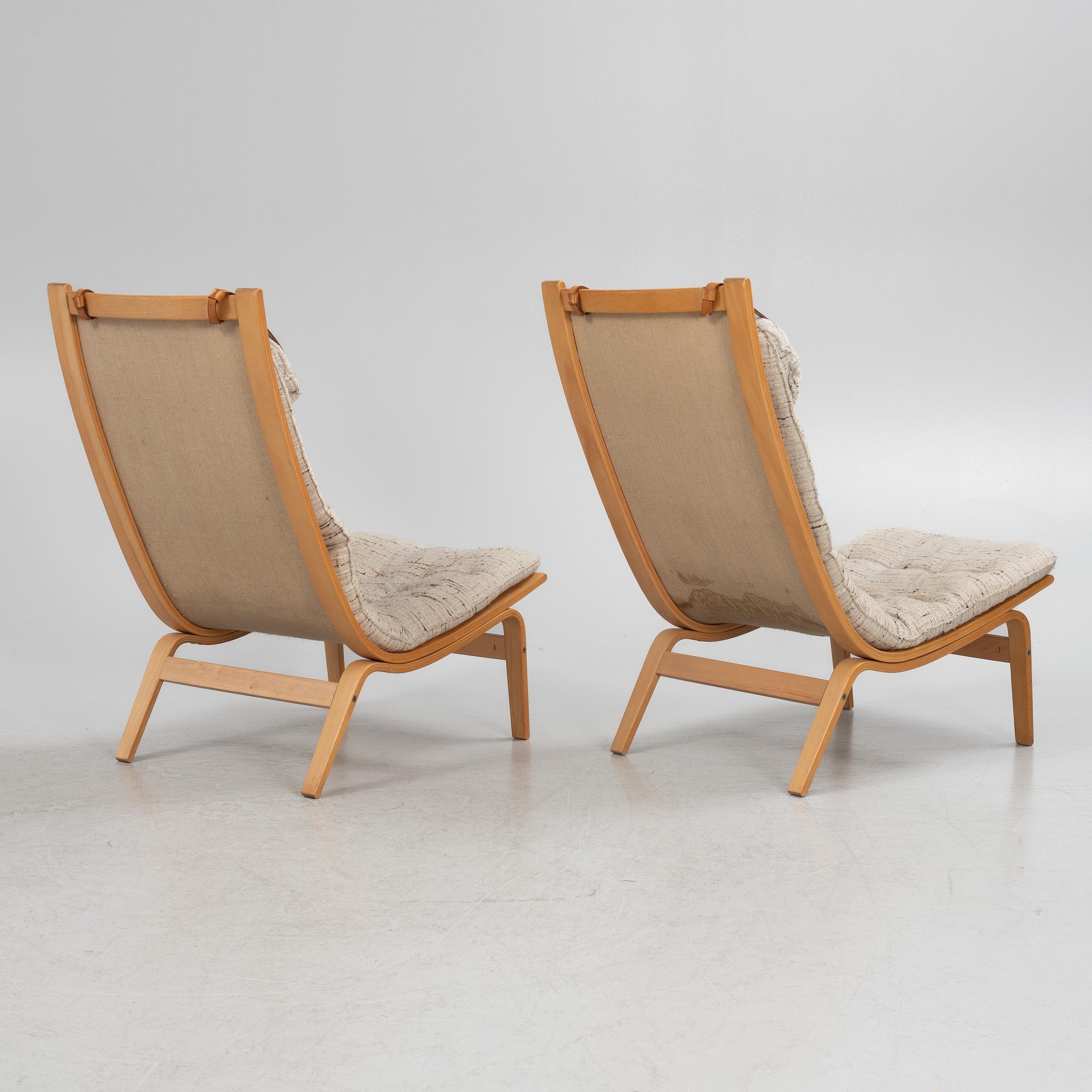 Knud Faerch, a pair of 'Bolman' armchairs, 1960's/70's.