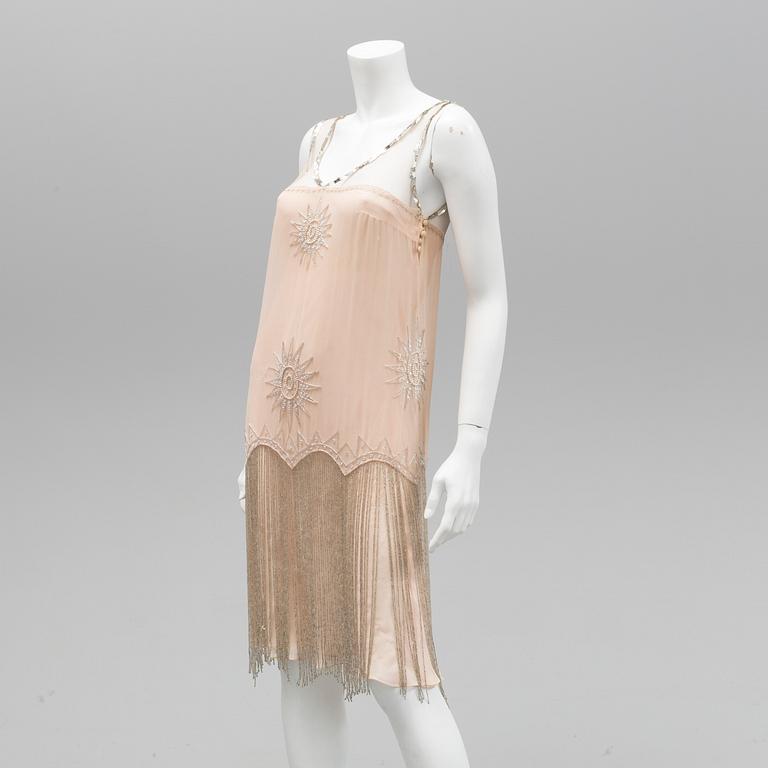 A coctaildress by Jenny Peckham, size 10.