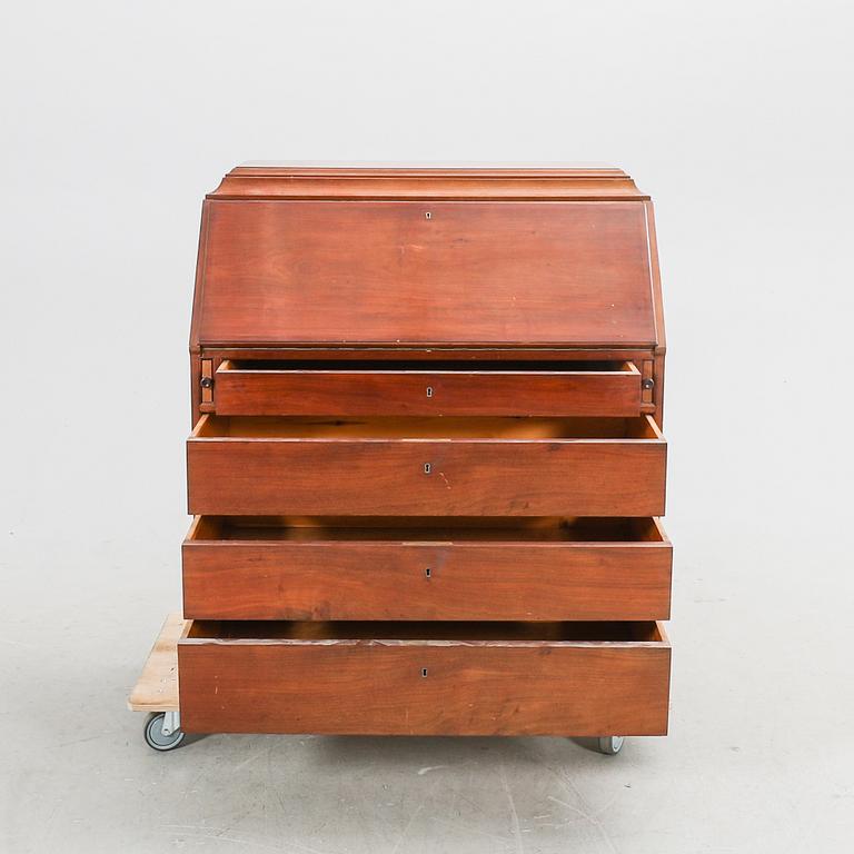 A mahogany flap secretaire first half of the 20th century.