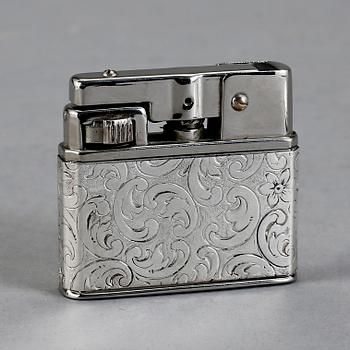 CIGARETTETUI och CIGARETTTÄNDARE, silver, 1900-talets första hälft.