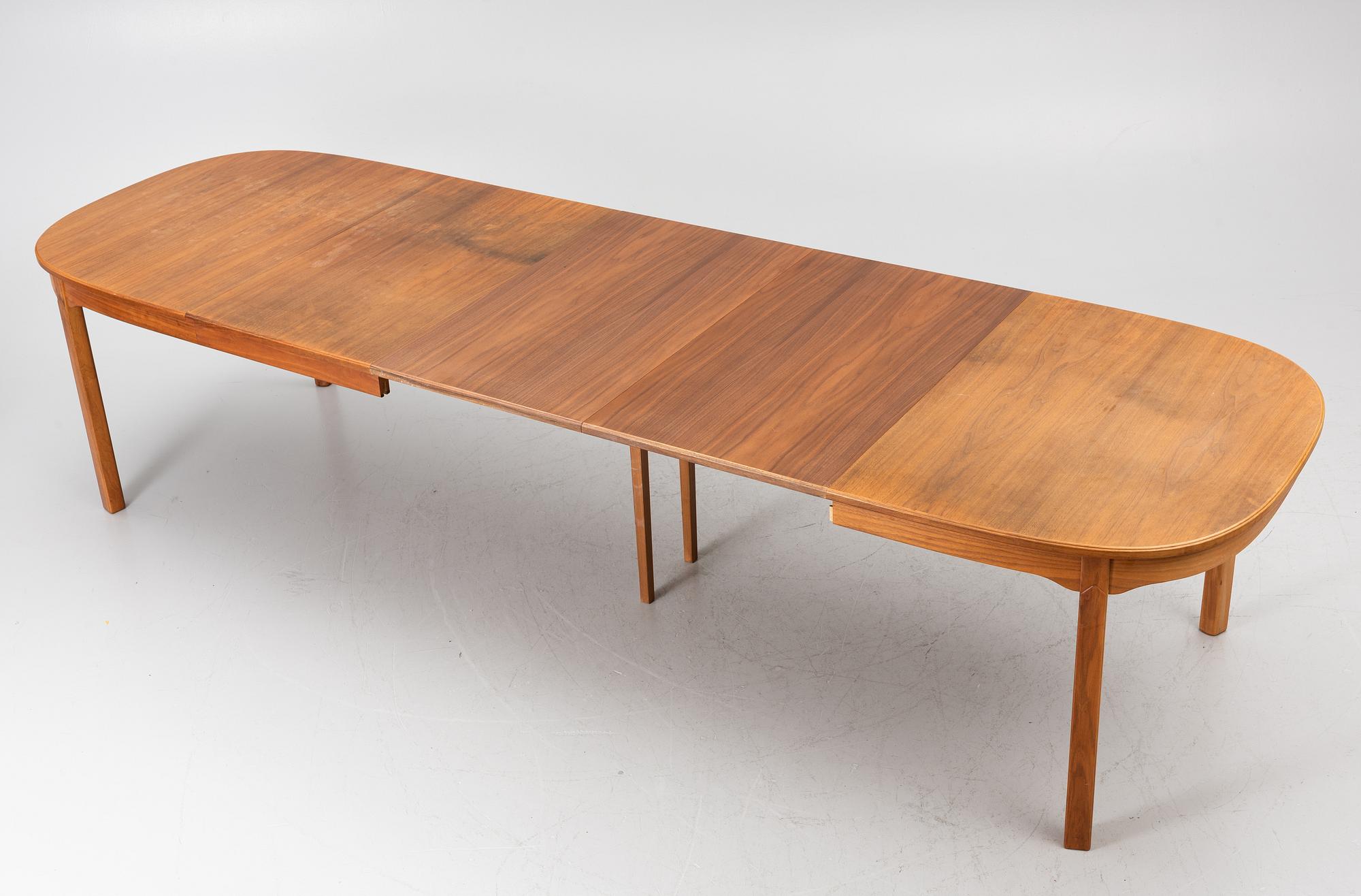 Carl Malmsten, Dining table with 2 armchairs and 6 chairs, 'Ambassador', Åfors Möbelfabrik, second half of the 20th century.