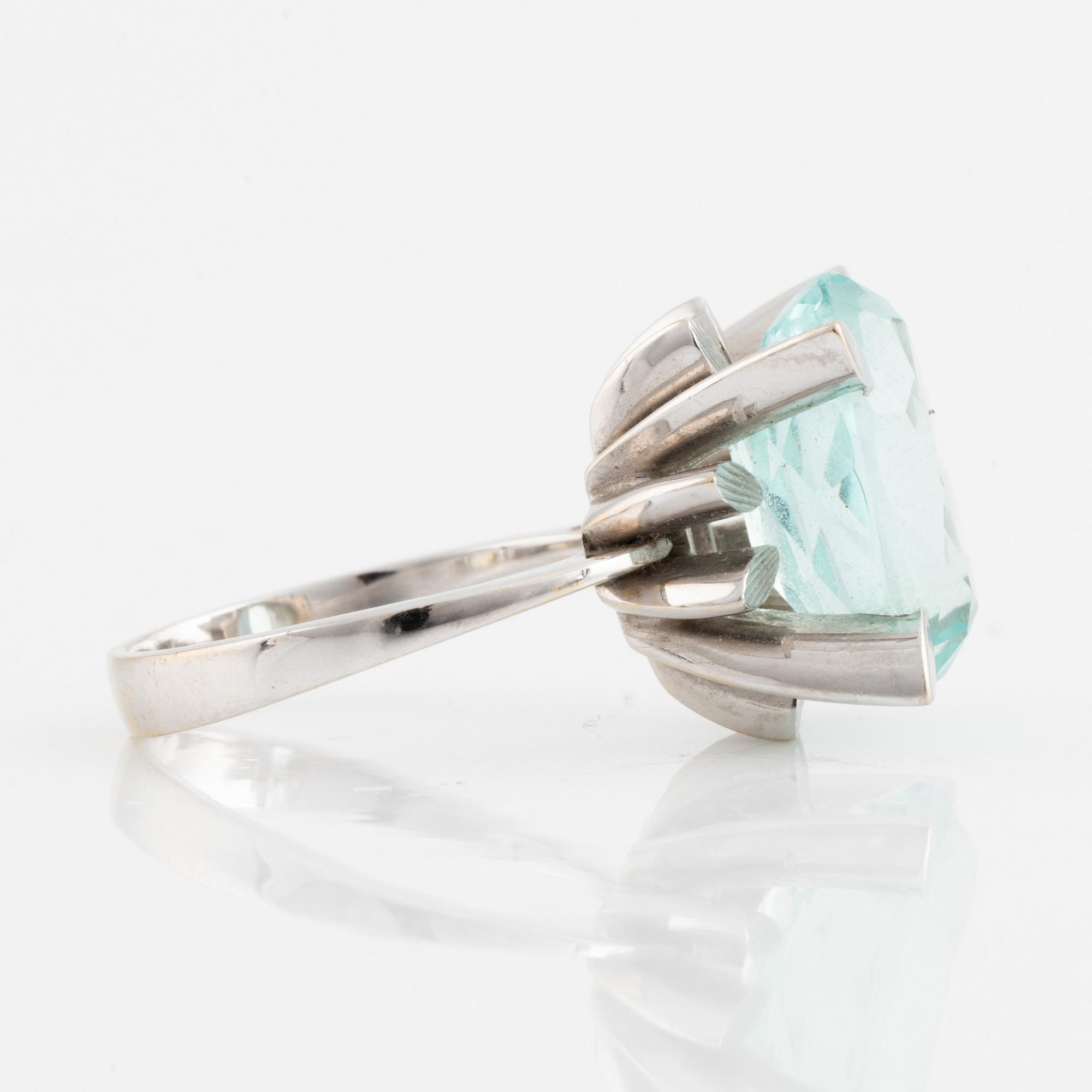 White gold and aquamarine ring.