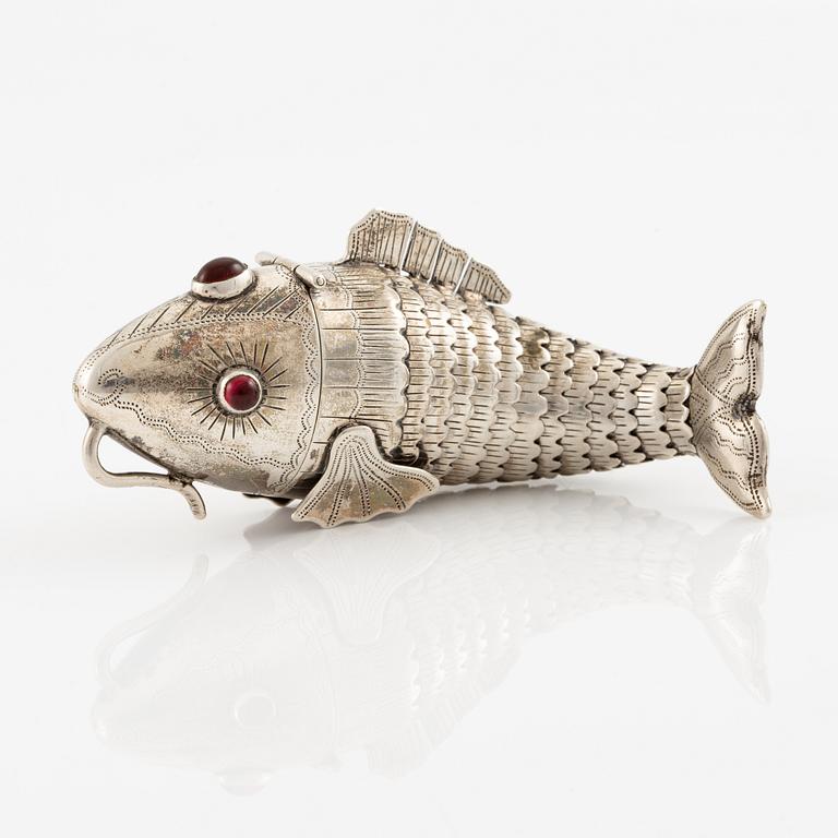 Pendant in the form of a fish, silver with red stones.