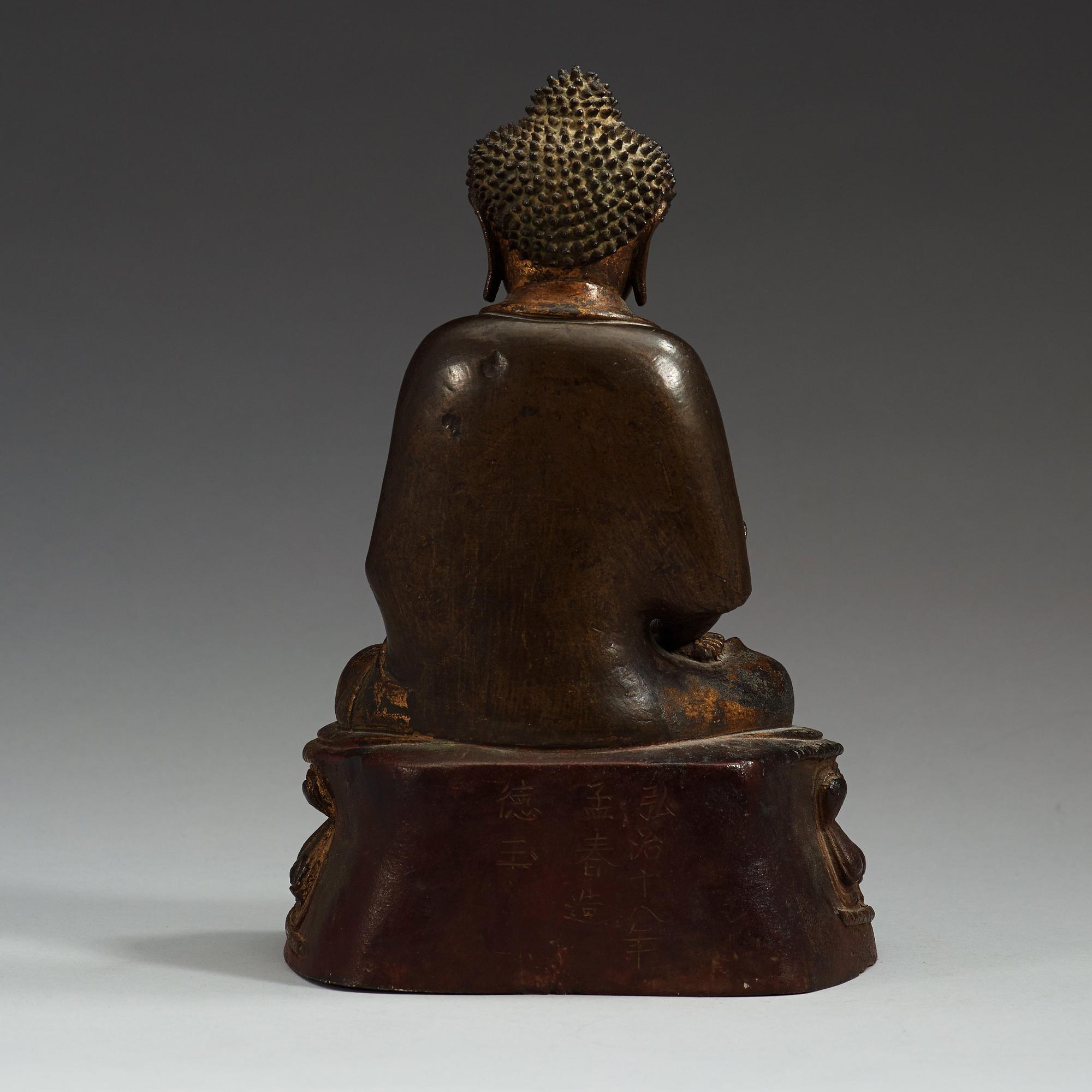 A gilt bronze figure of Buddha Sakyamuni, Ming dynasty (1368-1644).
