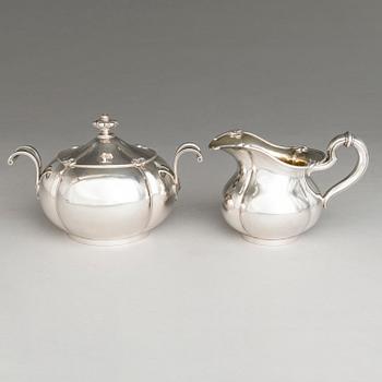 SAZIKOV, A 5-piece silver coffee and tea set, mark of the Sazikov Firm, Imperial Warrant, Saint Petersburg 1860.