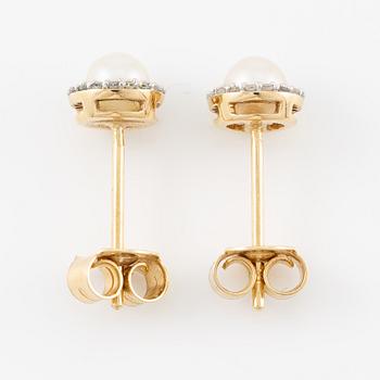 Earrings, a pair, 18K gold with pearls and small diamonds.