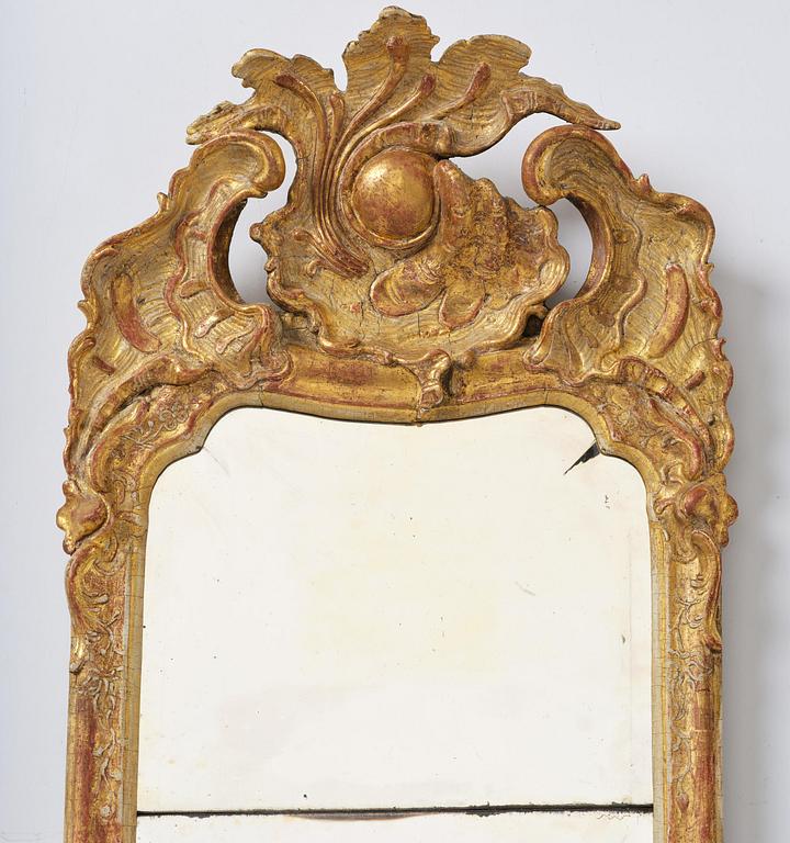 A rococo giltwood mirror attributed to E. Göbel (master in Stockholm 1744-64).