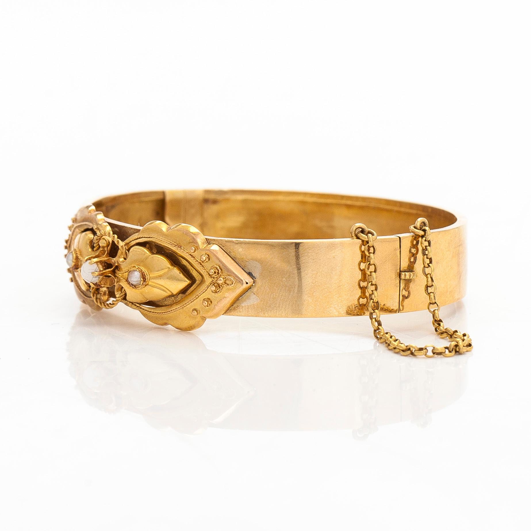 Gustav Lindell/Kustaa Hiekka, Rannekoru, 18K kultaa, puolihelmiä, Tampere 1889.