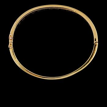 ARMRING, 18k guld med briljantslipade diamanter, totalt ca 2.50 ct, utländska stämplar. Vikt 21 g.