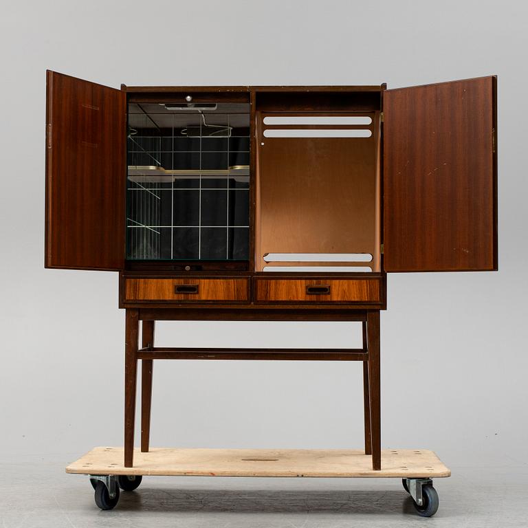 A rosewood veneered drinks cabinet, 1960's.