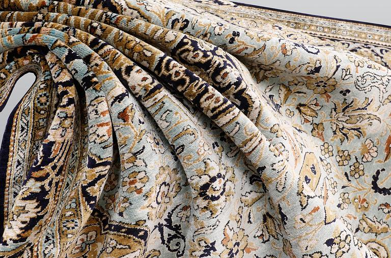 A carpet, silk Qum, ca 203 x 134 cm.