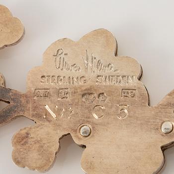 Wiwen Nilsson, brosch, i form av en kvist, förgyllt sterlingsilver, Lund 1969.