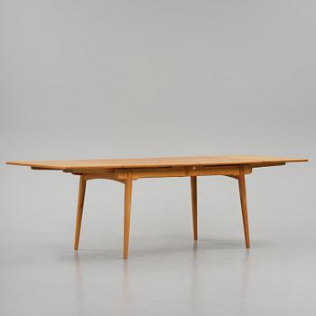Hans J. Wegner, an "AT-312" dining table, Andreas Tuck, Denmark, 1950s-60s.
