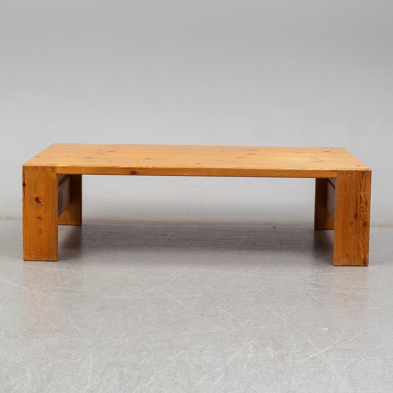 A 1960s pine coffee table.