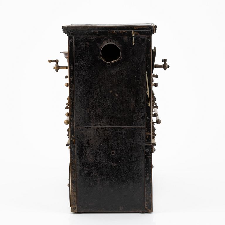 A toy stove, ca early 20th century.