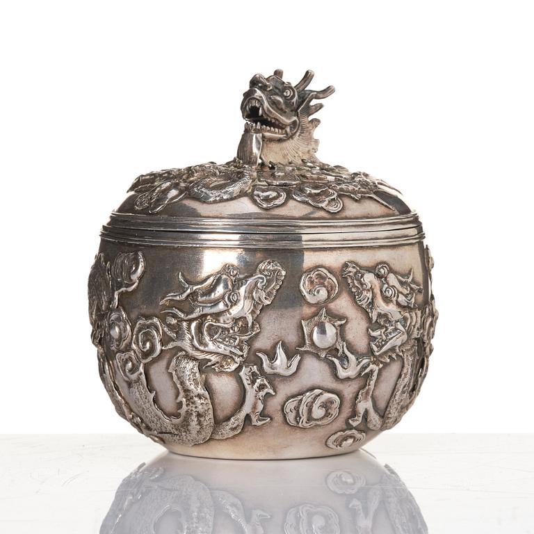 A Chinese Silver Dragon Bowl, mark of Wang Hing & Co, active c 1854-1925.