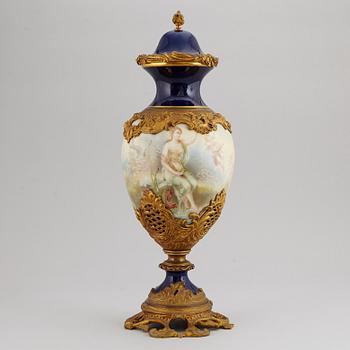 A bronze mounted porcelain vase, Sevres like mark, mid 20th Century.