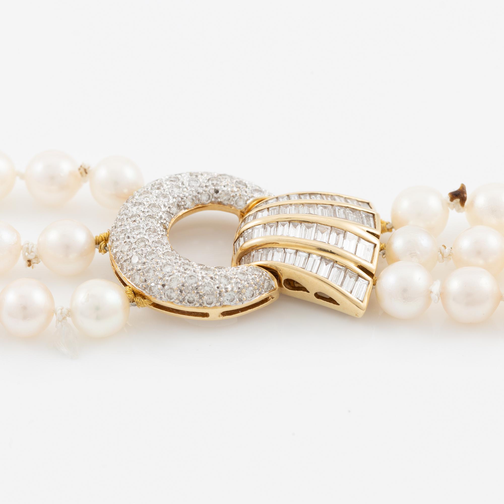 Pearl necklace, three strands of cultured pearls, clasp in 18K gold set with baguette and brilliant-cut diamonds.