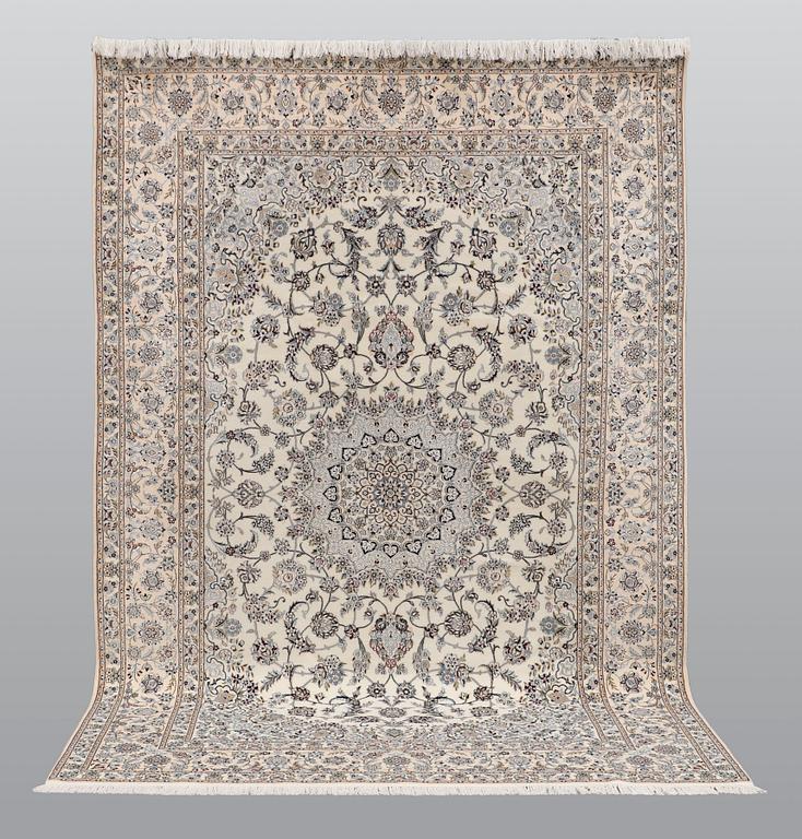 A carpet, Nain part silk s.k 6LAA, ca 310 X 209 cm.