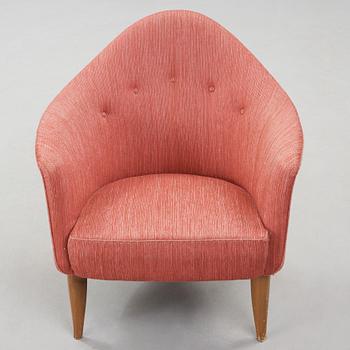 A chair "Lilla Adam" by Kerstin Hörlin-Holmquist.