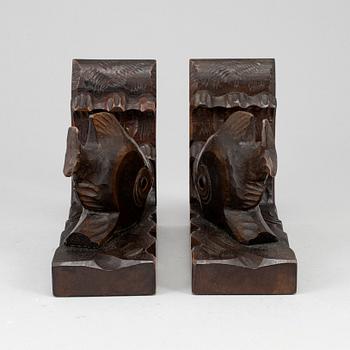 A pair of dark wood book ends, first half of the 20th century.