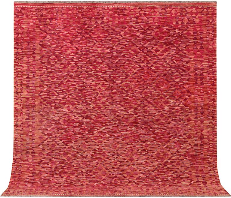 An Afghan Kelim carpet, c. 200 x 199 cm.
