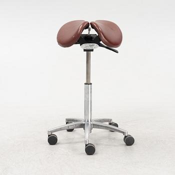 A 21 st century saddle stool from Salli, Finland.