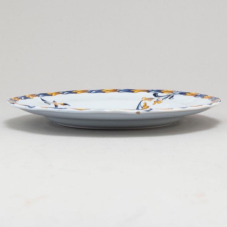 A set of four french faience cabinet plates signed Emile Gallé, Nancy. C. 1900.