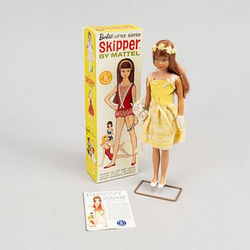 A collection of four Mattel 1960's Barbiedolls with accessories.