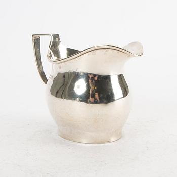 A 20th century silver milk pitcher London 1917 weight 260 grams.