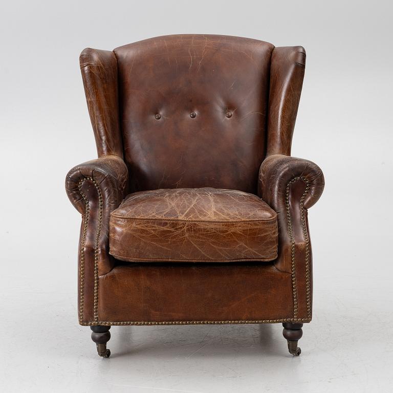 An armchair, contemporary.