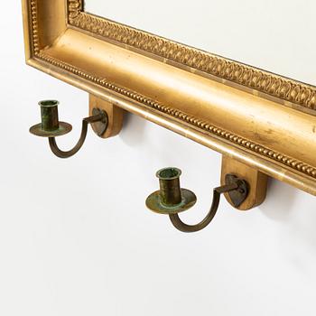 A pair of Empire giltwood two-branch girandole mirrors, Sweden, first part 19th century.