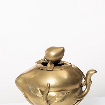 A Chinese brass 'peach' censer, first part of of the 20th century.