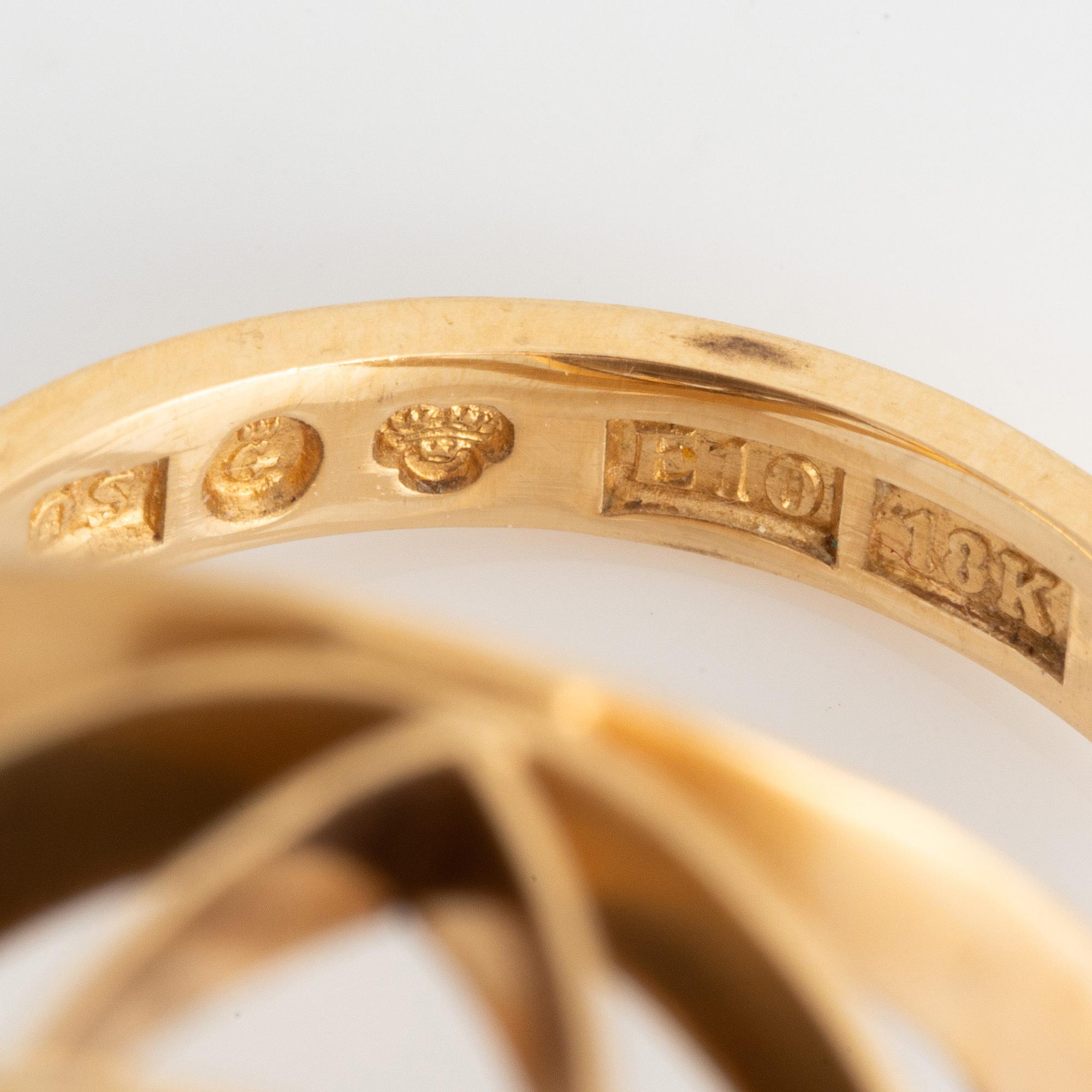 Ring, cocktail ring, 18K gold with smoky quartz.