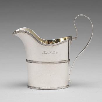 185. A Swedish early 19th century parcel-gilt silver cream-jug, mark of Nils Limnelius, Stockholm 1810.