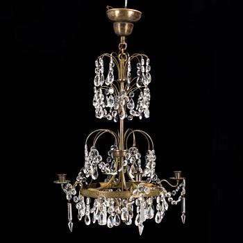 A mid-20th century, baroque style chandelier.